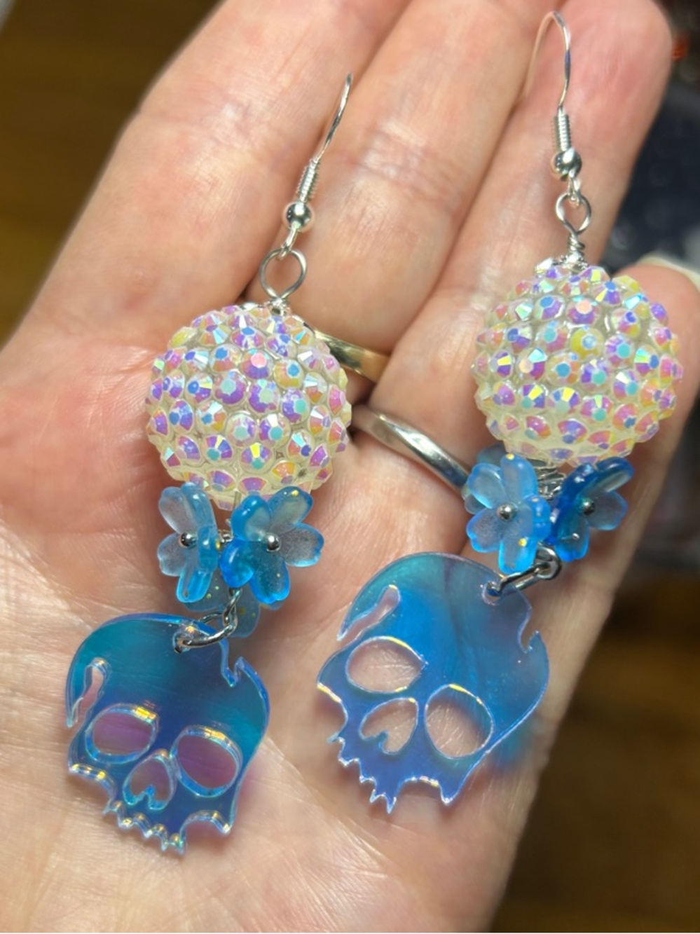 3/$25 Iridescent Blue Skull Dangle Earrings